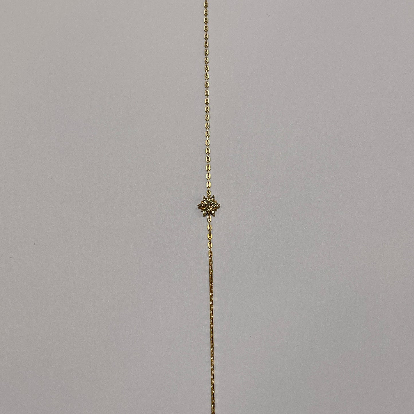 star bracelet in yellow gold - إسورة