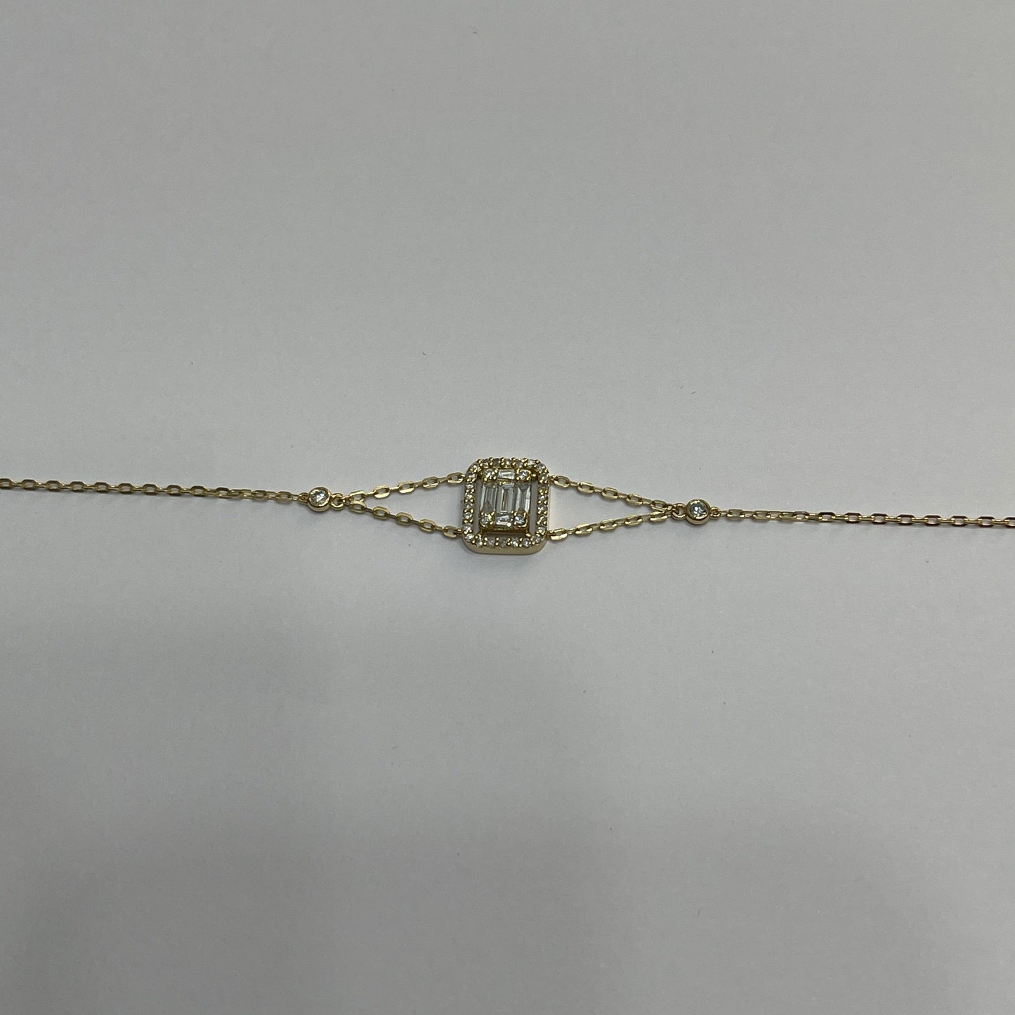 yellow gold baguette cluster 2 chain bracelet - إسورة
