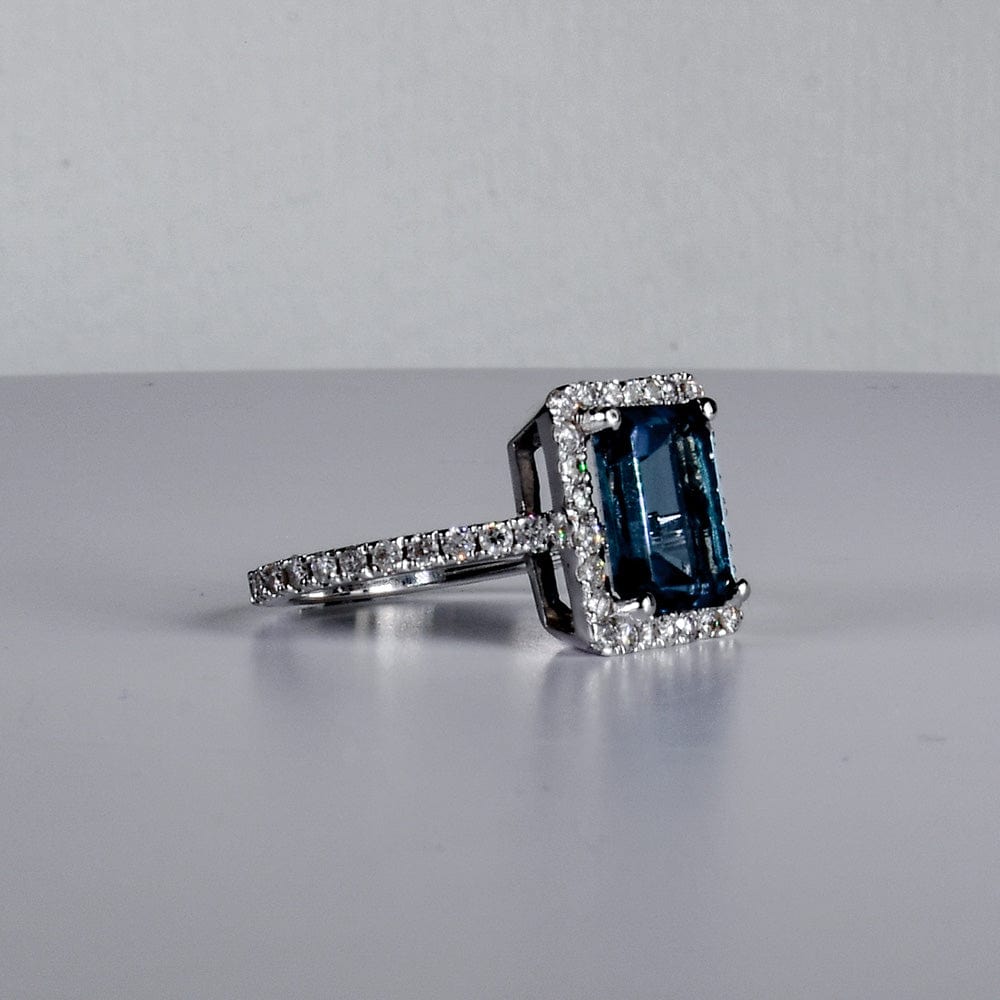 Emerald Cut Blue Topaz with Diamond Halo Ring- جرس - Luxury Diamond Jewelry shop Dubai - SABA DIAMONDS