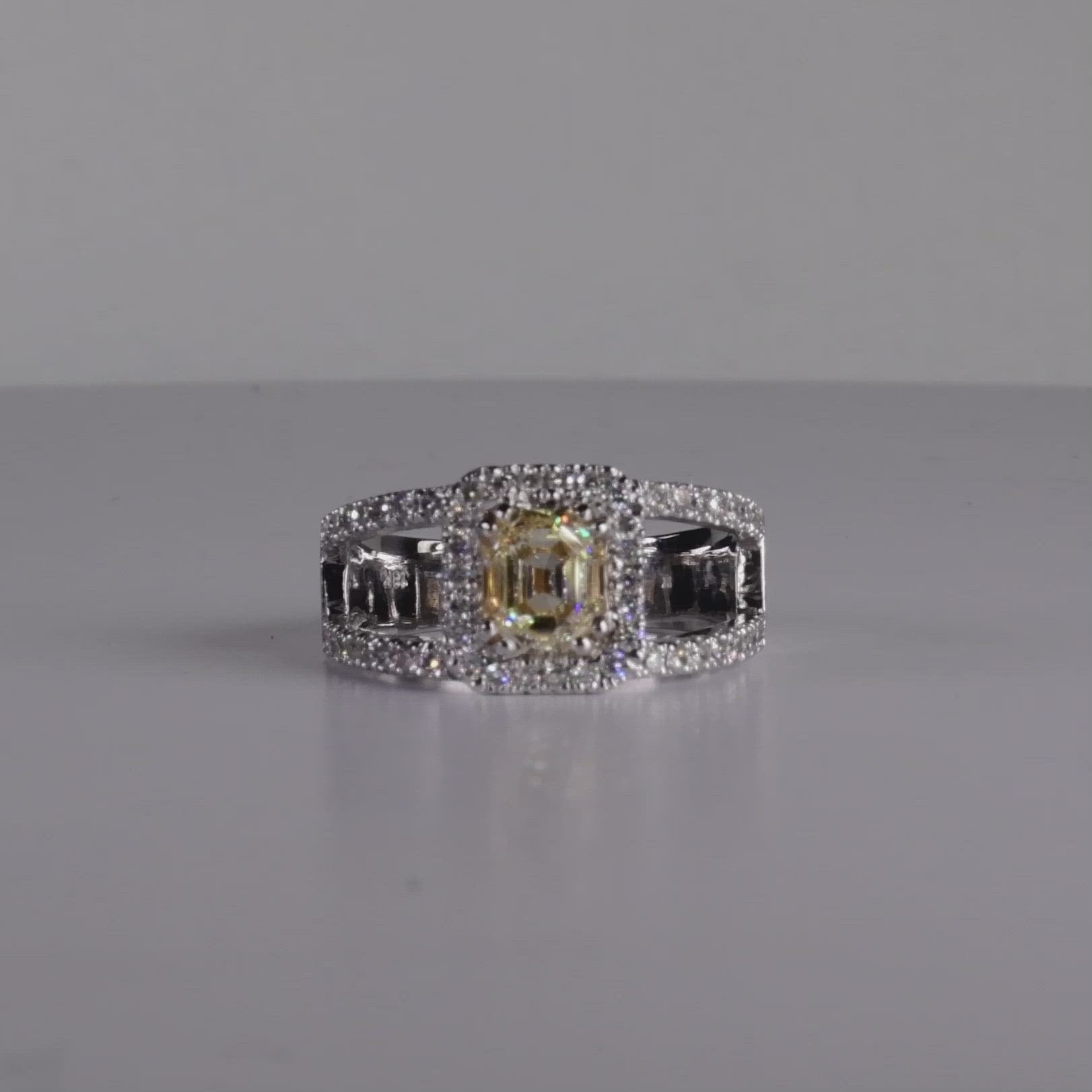 1.16ct Fancy Light Yellow Emerald Cut Diamond With Diamond Halo in